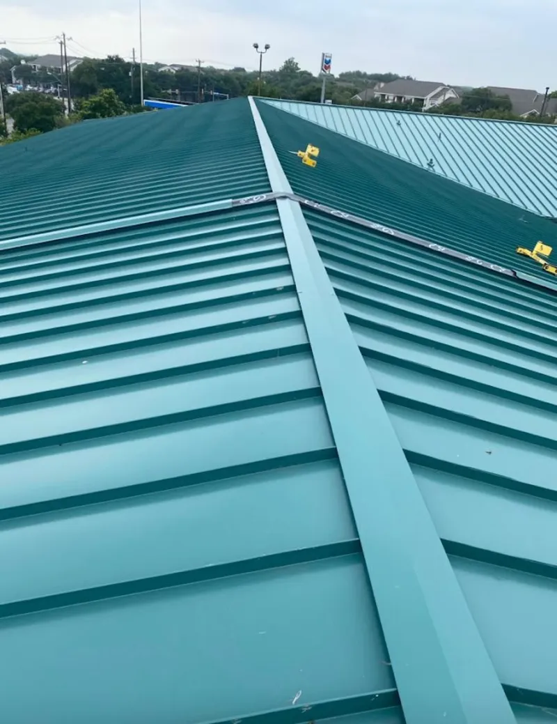 Green commercial metal roof ridge and valley for Metal Roof Repair in Altamonte Springs
